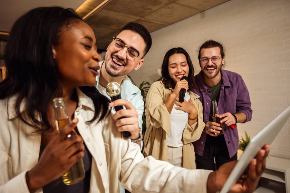 A group of friends having karaoke night.